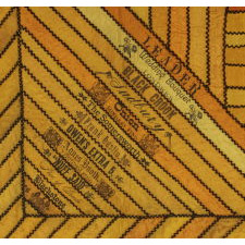 EXCEPTIONAL CIGAR SILK PIECEWORK GAME TABLE COVER, CIRCA 1894-1910
