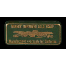 EXCEPTIONAL GOLD RUSH POCKET SCALE WITH GREEN, ENAMELED TIN, GILT EAGLE & LETTERING THAT READS: “MADE EXPRESSLY FOR CALIFORNIA,” circa 1850