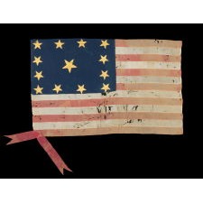 EXCEPTIONAL, HAND-SEWN, SILK FLAG WITH 13 GILT-PAINTED STARS ARRANGED IN THE "TRUMBULL” PATTERN, ONE OF JUST A TINY HANDFUL OF EARLY EXAMPLES TO SURVIVE IN THIS CONFIGURATION, FOUND IN SWITZERLAND, IN THE ESTATE OF A SWISS-AMERICAN WHO FOUGHT IN THE AMERICAN CIVIL WAR; THIS FLAG MADE IN THE LATE FEDERAL –ANTEBELLUM PERIOD, circa 1824-1851; EXHIBITED AT THE MUSEUM OF THE AMERICAN REVOLUTION FROM JUNE – JULY, 2019