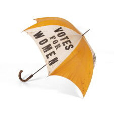 EXTRAORDINARILY RARE, YELLOW & WHITE, SUFFRAGE PARASOL / UMBRELLA, WITH “VOTES FOR WOMEN” TEXT, DISTRIBUTED BY THE NATIONAL AMERICAN WOMEN’S SUFFRAGE ASSOCIATION UNDER ANNA HOWARD SHAW’S LEADERSHIP [HEADQUARTERED IN NEW YORK], CIRCA 1913-1915