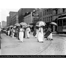 EXTRAORDINARILY RARE, YELLOW & WHITE, SUFFRAGE PARASOL / UMBRELLA, WITH “VOTES FOR WOMEN” TEXT, DISTRIBUTED BY THE NATIONAL AMERICAN WOMEN’S SUFFRAGE ASSOCIATION UNDER ANNA HOWARD SHAW’S LEADERSHIP [HEADQUARTERED IN NEW YORK], CIRCA 1913-1915