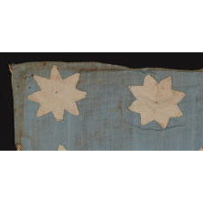 EXTRAORDINARY, HAND-SEWN, 13 STAR AMERICAN NATIONAL FLAG WITH 8-POINTED STARS ON A GLAZED COTTON, CORNFLOWER BLUE CANTON, 12 STRIPES, AND ITS CANTON RESTING ON THE WAR STRIPE, FOUND IN UPSTATE, NEW YORK, PRE-CIVIL WAR, CA 1830-1850; EXHIBITED AT THE MUSEUM OF THE AMERICAN REVOLUTION FROM JUNE – JULY, 2019
