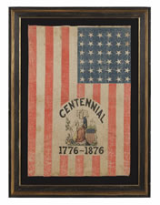 EXTREMELY RARE 36 STAR FLAG WITH A SIX COLOR OVERPRINT THAT INCLUDES THE FIGURE OF LADY COLUMBIA, MADE FOR THE 1876 CENTENNIAL EXPOSITION, POSSIBLY DISTRIBUTED DURING THE PRESIDENTIAL CAMPAIGN OF RUTHERFORD B. HAYES