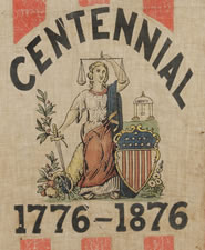 EXTREMELY RARE 36 STAR FLAG WITH A SIX COLOR OVERPRINT THAT INCLUDES THE FIGURE OF LADY COLUMBIA, MADE FOR THE 1876 CENTENNIAL EXPOSITION, POSSIBLY DISTRIBUTED DURING THE PRESIDENTIAL CAMPAIGN OF RUTHERFORD B. HAYES