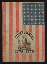 EXTREMELY RARE 36 STAR FLAG WITH A SIX COLOR OVERPRINT THAT INCLUDES THE FIGURE OF LADY COLUMBIA, MADE FOR THE 1876 CENTENNIAL EXPOSITION, POSSIBLY DISTRIBUTED DURING THE PRESIDENTIAL CAMPAIGN OF RUTHERFORD B. HAYES