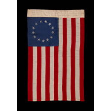13 HAND-EMBROIDERED STARS AND EXPERTLY HAND-SEWN STRIPES ON AN ANTIQUE AMERICAN FLAG MADE IN PHILADELPHIA BY RACHEL ALBRIGHT, GRANDDAUGHTER OF BETSY ROSS, SIGNED & DATED 1903