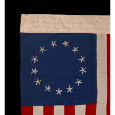 13 HAND-EMBROIDERED STARS AND EXPERTLY HAND-SEWN STRIPES ON AN ANTIQUE AMERICAN FLAG MADE IN PHILADELPHIA BY RACHEL ALBRIGHT, GRANDDAUGHTER OF BETSY ROSS, SIGNED & DATED 1903