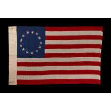 13 HAND-EMBROIDERED STARS AND EXPERTLY HAND-SEWN STRIPES ON AN ANTIQUE AMERICAN FLAG MADE IN PHILADELPHIA BY RACHEL ALBRIGHT, GRANDDAUGHTER OF BETSY ROSS, SIGNED & DATED 1903