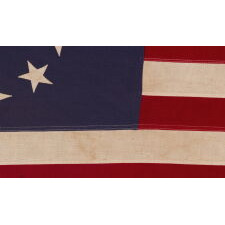 13 STARS IN THE BETSY ROSS PATTERN, ON A VINTAGE AMERICAN FLAG, MADE BY THE ANNIN COMPANY OF NEW YORK & NEW JERSEY, circa 1955 - 1965