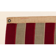 13 STARS WITH SHORT, CONICAL ARMS ON A SMALL SCALE, ANTIQUE AMERICAN FLAG MADE DURING THE LAST DECADE F THE 19TH CENTURY; POSSIBLY OF PHILADELPHIA ORIGIN; FORMERLY IN THE COLLECTION OF BOLESLAW & MARIE D'OTRANGE MASTAI, THE FIRST MAJOR COLLECTORS TO PUBLISH A PICTORIAL REFERENCE (KNOPF, NEW YORK, 1973):