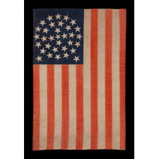 33 STARS IN A MEDALLION CONFIGURATION ON A LARGE SCALE ANTIQUE AMERICAN PARADE FLAG, AN EXTREMELY RARE EXAMPLE, OREGON STATEHOOD, 1859-1861