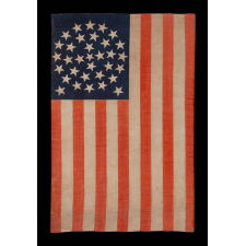 33 STARS IN A MEDALLION CONFIGURATION ON A LARGE SCALE ANTIQUE AMERICAN PARADE FLAG, AN EXTREMELY RARE EXAMPLE, OREGON STATEHOOD, 1859-1861