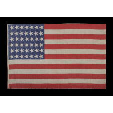 42 CANTED STARS ON AN ANTIQUE AMERICAN FLAG THAT REFLECTS THE ADDITION OF WASHINGTON STATE, MONTANA, AND THE DAKOTAS, NEVER AN OFFICIAL STAR COUNT, circa 1889-1890