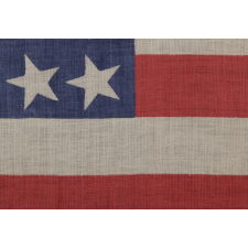 42 CANTED STARS ON AN ANTIQUE AMERICAN FLAG THAT REFLECTS THE ADDITION OF WASHINGTON STATE, MONTANA, AND THE DAKOTAS, NEVER AN OFFICIAL STAR COUNT, circa 1889-1890