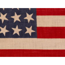 42 STARS ON AN ANTIQUE AMERICAN FLAG WITH SCATTERED STAR POSITIONING, REFLECTS THE ADDITION OF WASHINGTON STATE, MONTANA, AND THE DAKOTAS, NEVER AN OFFICIAL STAR COUNT, circa 1889-1890