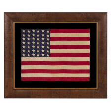 42 STARS ON AN ANTIQUE AMERICAN FLAG WITH A WAVE CONFIGURATION OF LINEAL COLUMNS, AN UNOFFICIAL STAR COUNT THAT REFLECTS THE ADDITION OF WASHINGTON STATE, MONTANA, AND THE DAKOTAS, circa 1889-1890