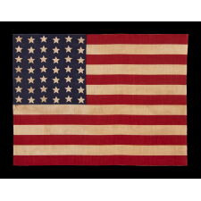 42 STARS ON AN ANTIQUE AMERICAN FLAG WITH A WAVE CONFIGURATION OF LINEAL COLUMNS, AN UNOFFICIAL STAR COUNT THAT REFLECTS THE ADDITION OF WASHINGTON STATE, MONTANA, AND THE DAKOTAS, circa 1889-1890