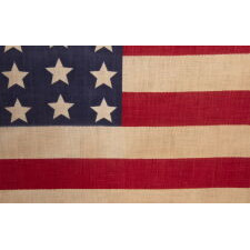 42 STARS ON AN ANTIQUE AMERICAN FLAG WITH A WAVE CONFIGURATION OF LINEAL COLUMNS, AN UNOFFICIAL STAR COUNT THAT REFLECTS THE ADDITION OF WASHINGTON STATE, MONTANA, AND THE DAKOTAS, circa 1889-1890