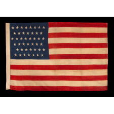 44 STARS IN ZIGZAGGING ROWS ON A PRESS-DYED WOOL AMERICAN FLAG MADE BY THE HORSTMANN COMPANY IN PHILADELPHIA, REFLECTS THE PERIOD WHEN WYOMING WAS THE MOST RECENT STATE TO JOIN THE UNION, 1890-1896