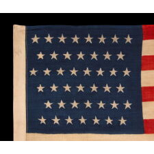 44 STARS IN ZIGZAGGING ROWS ON A PRESS-DYED WOOL AMERICAN FLAG MADE BY THE HORSTMANN COMPANY IN PHILADELPHIA, REFLECTS THE PERIOD WHEN WYOMING WAS THE MOST RECENT STATE TO JOIN THE UNION, 1890-1896