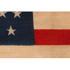 44 STARS IN ZIGZAGGING ROWS ON A PRESS-DYED WOOL AMERICAN FLAG MADE BY THE HORSTMANN COMPANY IN PHILADELPHIA, REFLECTS THE PERIOD WHEN WYOMING WAS THE MOST RECENT STATE TO JOIN THE UNION, 1890-1896