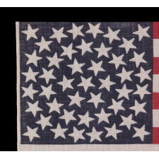 45 STARS ON AN ANTIQUE AMERICAN PARADE FLAG WITH A MEDALLION CONFIGURATION, A RARE FEATURE IN THIS PERIOD, 1896-1908, UTAH STATEHOOD