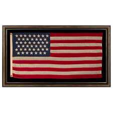 45 STARS ON AN ANTIQUE AMERICAN FLAG OF THE 1896-1908 ERA, REFLECTS THE ADDITION OF UTAH AS THE 45TH STATE; SPANISH-AMERICAN WAR ERA; AN ESPECIALLY BEAUTIFUL EXAMPLE WITH LARGER STARS THAN MOST AND EXCEPTIONAL, TRADITIONAL SHADES OF SCARLET RED AND NAVY