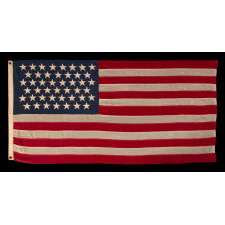 45 STARS ON AN ANTIQUE AMERICAN FLAG OF THE 1896-1908 ERA, REFLECTS THE ADDITION OF UTAH AS THE 45TH STATE; SPANISH-AMERICAN WAR ERA; AN ESPECIALLY BEAUTIFUL EXAMPLE WITH LARGER STARS THAN MOST AND EXCEPTIONAL, TRADITIONAL SHADES OF SCARLET RED AND NAVY