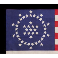 48 STARS ON AN ANTIQUE AMERICAN FLAG DESIGNED AND COMMISSIONED BY WAYNE WHIPPLE OF PHILADELPHIA, 1909-1912, A RARE AND HIGHLY DESIRED, SILK EXAMPLE, IN AN EXCEPTIONAL STATE OF PRESERVATION