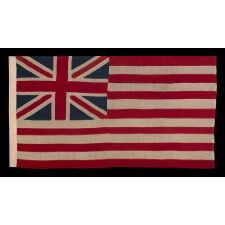 EXTRAORDINARILY RARE, 1876 EXAMPLE OF THE FIRST NATIONAL FLAG OF AMERICA, THE “GRAND UNION” OR “CONTINENTAL COLORS,” MADE TO CELEBRATE THE 100TH ANNIVERSARY OF AMERICAN INDEPENDENCE, ALMOST CERTAINLY FOR DISPLAY AT THE CENTENNIAL INTERNATIONAL EXHIBITION IN PHILADELPHIA