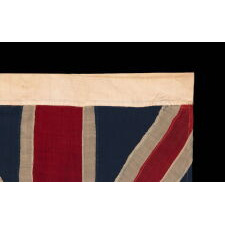 EXTRAORDINARILY RARE, 1876 EXAMPLE OF THE FIRST NATIONAL FLAG OF AMERICA, THE “GRAND UNION” OR “CONTINENTAL COLORS,” MADE TO CELEBRATE THE 100TH ANNIVERSARY OF AMERICAN INDEPENDENCE, ALMOST CERTAINLY FOR DISPLAY AT THE CENTENNIAL INTERNATIONAL EXHIBITION IN PHILADELPHIA