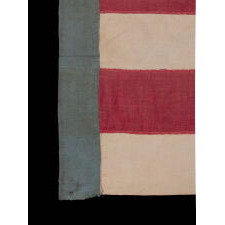 28 STAR, HOMEMADE, ANTIQUE AMERICAN FLAG WITH A CORNFLOWER BLUE CANTON RESTING ON THE “BLOOD” STRIPE; REFLECTS THE ADDITION OF TEXAS ON DEC. 29th, 1845; MEXICAN-WAR ERA; ONE OF THE RAREST STAR COUNTS OF THE 19th CENTURY, OFFICIAL FOR JUST ONE YEAR (1846-47); THE COMPLEMENT OF 14 STRIPES DISPLAYS NATIONAL DISUNION, REFLECTING ALL OF THE SLAVE-HOLDING STATES SAVE DELAWARE, WHERE THE INSTITUTION HAD BEEN DWINDLING FOR DECADES & POLITICIANS COULD NOT BE TRUSTED TO VOTE WITH A UNIFIED BLOC