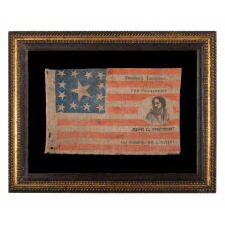 EXTRAORDINARILY RARE, PORTRAIT STYLE PARADE FLAG, MADE FOR THE PRESIDENTIAL CAMPAIGN OF JOHN FRÉMONT, WHO OPENED THE GATEWAY TO CALIFORNIA STATEHOOD, WAS THE REPUBLICAN PARTY’S FIRST PRESIDENTIAL CANDIDATE, AND RAN ON AN ANTI-SLAVERY PLATFORM; DISPLAYING 13 STARS, ARRANGED IN THE TRUMBULL PATTERN