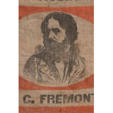 EXTRAORDINARILY RARE, PORTRAIT STYLE PARADE FLAG, MADE FOR THE PRESIDENTIAL CAMPAIGN OF JOHN FRÉMONT, WHO OPENED THE GATEWAY TO CALIFORNIA STATEHOOD, WAS THE REPUBLICAN PARTY’S FIRST PRESIDENTIAL CANDIDATE, AND RAN ON AN ANTI-SLAVERY PLATFORM; DISPLAYING 13 STARS, ARRANGED IN THE TRUMBULL PATTERN