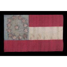 EXTRAORDINARY, HOMEMADE, 1ST CONFEDERATE NATIONAL FLAG, MADE OF LADIES’ DRESS SILK, WITH BEAUTIFUL COLORS AND EXCEPTIONAL PRESSED FOIL STARS, POSSIBLY OF NORTH CAROLINA ORIGIN; LIKELY PRESENTED TO AN OFFICER BY A LOVED ONE AND SEEMINGLY DISPLAYED THEREAFTER AS CONDITIONS PERMITTED; CAPTURED OR SEIZED BY CHAPLAIN-TURNED-GENERAL ELIPHALET WHITTLESEY OF MAINE, A STRONG OPPONENT OF SLAVERY, WHO EVENTUALLY LED AN ALL-BLACK REGIMENT (46TH U.S. COLORED TROOPS)