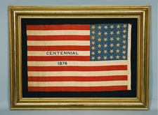 RARE 38 STAR ANTIQUE AMERICAN PARADE FLAG WITH "1876 CENTENNIAL" ADVERTISING & GOLD STARS, MADE FOR THE 1876 CENTENNIAL INTERNATIONAL EXPOSITION IN PHILADELPHIA