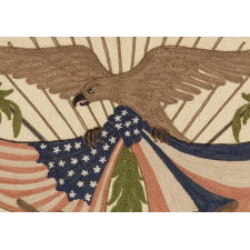 FRANCO-AMERICAN TEXTILE WITH THE IMAGE OF AN EAGLE SUPPORTING KNOTTED & DRAPED AMERICAN AND FRENCH FLAGS BENEATH FOUR WAR PLANES; RENDERED IN EMBROIDERED SILK FLOSS AND METALLIC BULLION ON SILK, MADE TO CELEBRATE THE END OF WWI