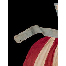 ENTIRELY HAND-SEWN, CIVIL WAR PERIOD APRON WITH 13 HAND-EMBROIDERED STARS & 13 STRIPES, OF A TYPE WORN BY YOUNG WOMEN AT BENEFITS FOR THE UNITED STATES SANITARY COMMISSION, WHICH STAFFED, FUNDED, & MODERNIZED CIVIL WAR HOSPITALS, PREDECESSOR TO THE RED CROSS, 1861-1865