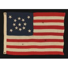 13 STARS ARRANGED IN A MEDALLION PATTERN ON A SMALL-SCALE ANTIQUE AMERICAN FLAG OF THE 1895-1920's ERA