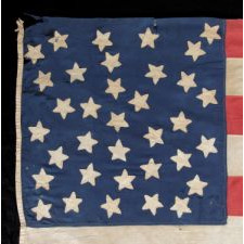 35 STARS ON ONE SIDE AND 36 ON THE OTHER, ARRANGED IN A RARE RANDOM SCATTER WITH NO PARTICULAR PATTERN, ON A CIVIL WAR PERIOD FLAG WITH GREAT FOLK QUALITIES; REPRESENTS THE ADDITION OF BOTH WEST VIRGINIA AND NEVADA, 1863-1865