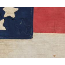 35 STARS ON ONE SIDE AND 36 ON THE OTHER, ARRANGED IN A RARE RANDOM SCATTER WITH NO PARTICULAR PATTERN, ON A CIVIL WAR PERIOD FLAG WITH GREAT FOLK QUALITIES; REPRESENTS THE ADDITION OF BOTH WEST VIRGINIA AND NEVADA, 1863-1865