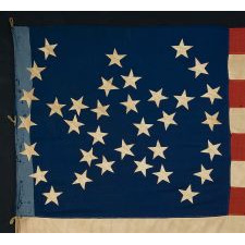 34 STAR AMERICAN NATIONAL FLAG WITH A UNIQUE "GREAT STAR" PATTERN, FLANKED BY ARCHED BRACKETS, CIVIL WAR PERIOD, 1861-63, SEEMINGLY OF PROVENCETOWN MASSACHUSETTS ORIGIN