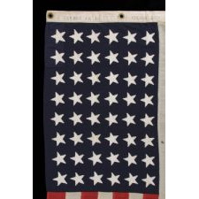 48 STAR, U.S. NAVY SMALL BOAT ENSIGN WITH AN ATTRACTIVE, ELONGATED FORMAT, MADE AT MARE ISLAND, CALIFORNIA DURING WWII, SIGNED AND DATED JULY, 1943
