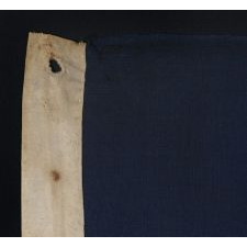 ENTIRELY HAND-SEWN, 13 STAR, U.S. NAVY SMALL BOAT ENSIGN WITH A 4-5-4 CONFIGURATION OF SINGLE-APPLIQUÉD STARS, MADE SOMETIME BETWEEN 1850 AND THE OPENING YEARS OF THE CIVIL WAR (1854-64)