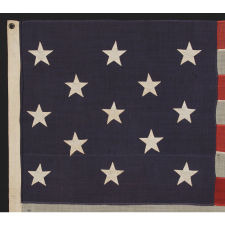 13 STARS IN A 3-2-3-2-3 CONFIGURATION, AN ATTRACTIVE FLAG IN A SMALL SCALE WITH PLEASING PROPORTIONS, MADE BETWEEN 1876 AND THE 1890's