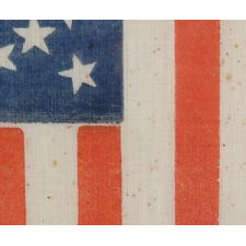 38 STARS IN A MEDALLION CONFIGURATION WITH 2 OUTLIERS AND VIBRANT COLORATION, COLORADO STATEHOOD, 1876-1889, FORMERLY IN THE COLLECTION OF RICHARD PIERCE AND PICTURED IN HIS TEXT ON FLAG COLLECTING