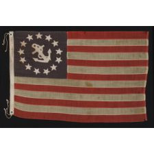 13 STAR PRIVATE YACHT FLAG, A SCARCE AND DESIRABLE EXAMPLE WITH SINGLE-APPLIQUÉD, HAND-SEWN STARS AND ANCHOR, MADE BY ANNIN IN NEW YORK CITY, CA 1875-1890's