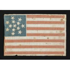 RARE 13 STAR PARADE FLAG DATING TO THE CIVIL WAR PERIOD (1861-65) OR PRIOR, WITH AN EXCEPTIONALLY RARE AND BEAUTIFUL SNOWFLAKE MEDALLION CONFIGURATION OF 13 STARS