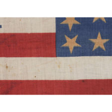 RARE 38 STAR PARADE FLAG WITH "1876 CENTENNIAL" ADVERTISING & GOLD STARS, MADE FOR THE PHILADELPHIA CENTENNIAL INTERNATIONAL EXPOSITION