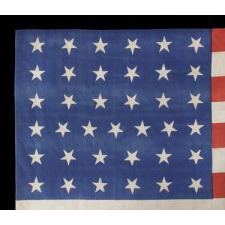 37 STARS ON A LARGE SCALE SILK PARADE FLAG WITH "DANCING" OR "TUMBLING" ORIENTATION, NEBRASKA STATEHOOD, 1867-1876, THE ERA OF AMERICAN RECONSTRUCTION